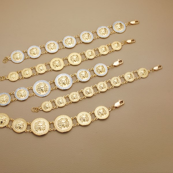 18K PULSERA ORO BICOLOR CON MEDUSAS...